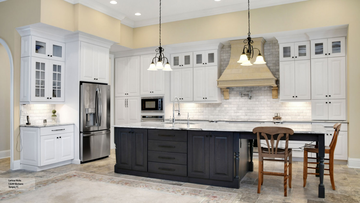 Kitchen with White Cabinets and a Gray Island - Omega