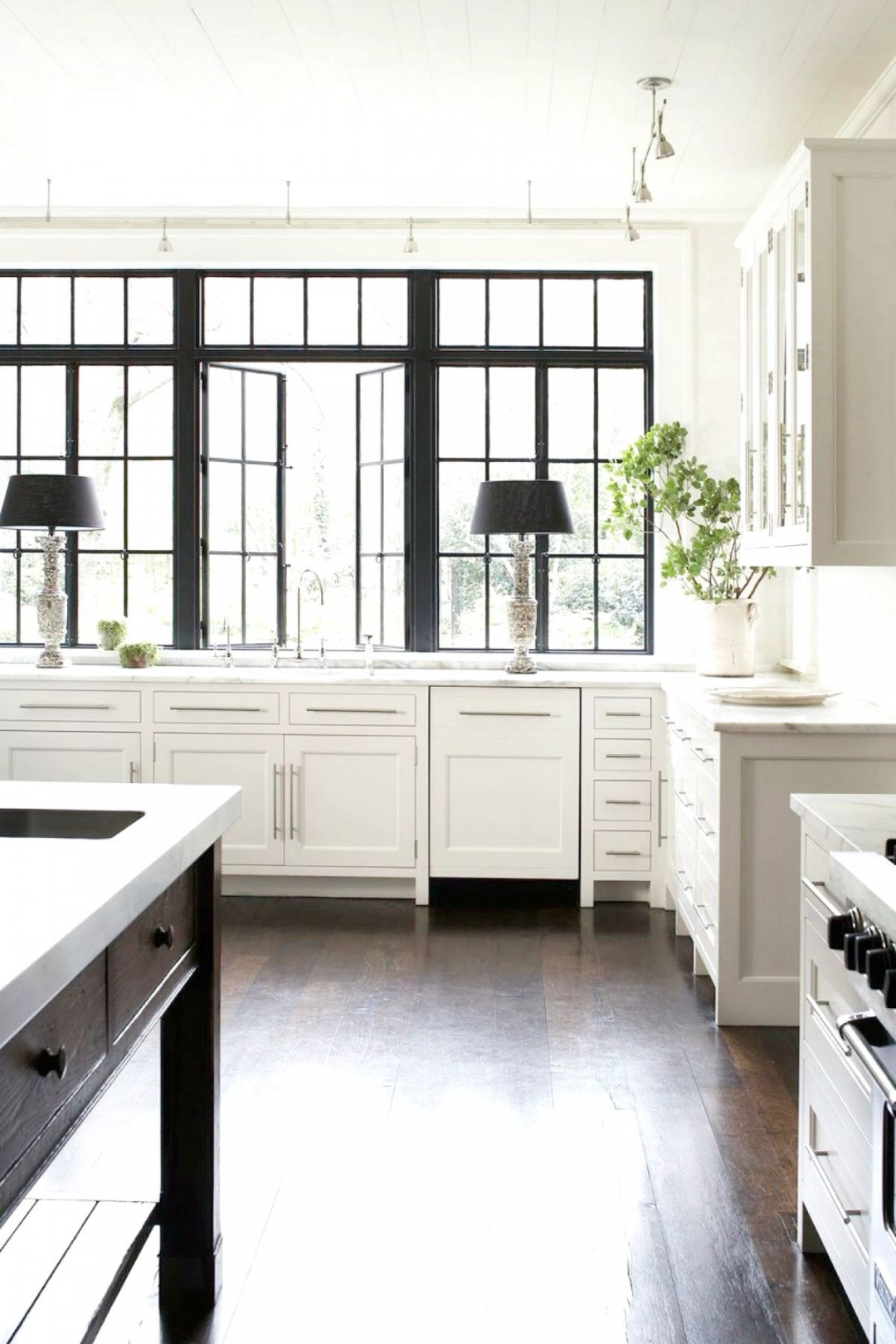 Beautiful white kitchen with black frame windows  Gorgeous white