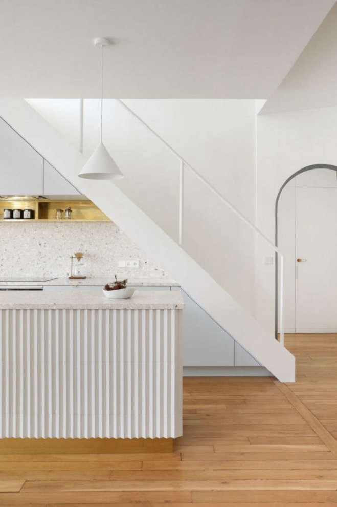 Fluted Architectural Detailing on Kitchen Islands and Wall Paneling