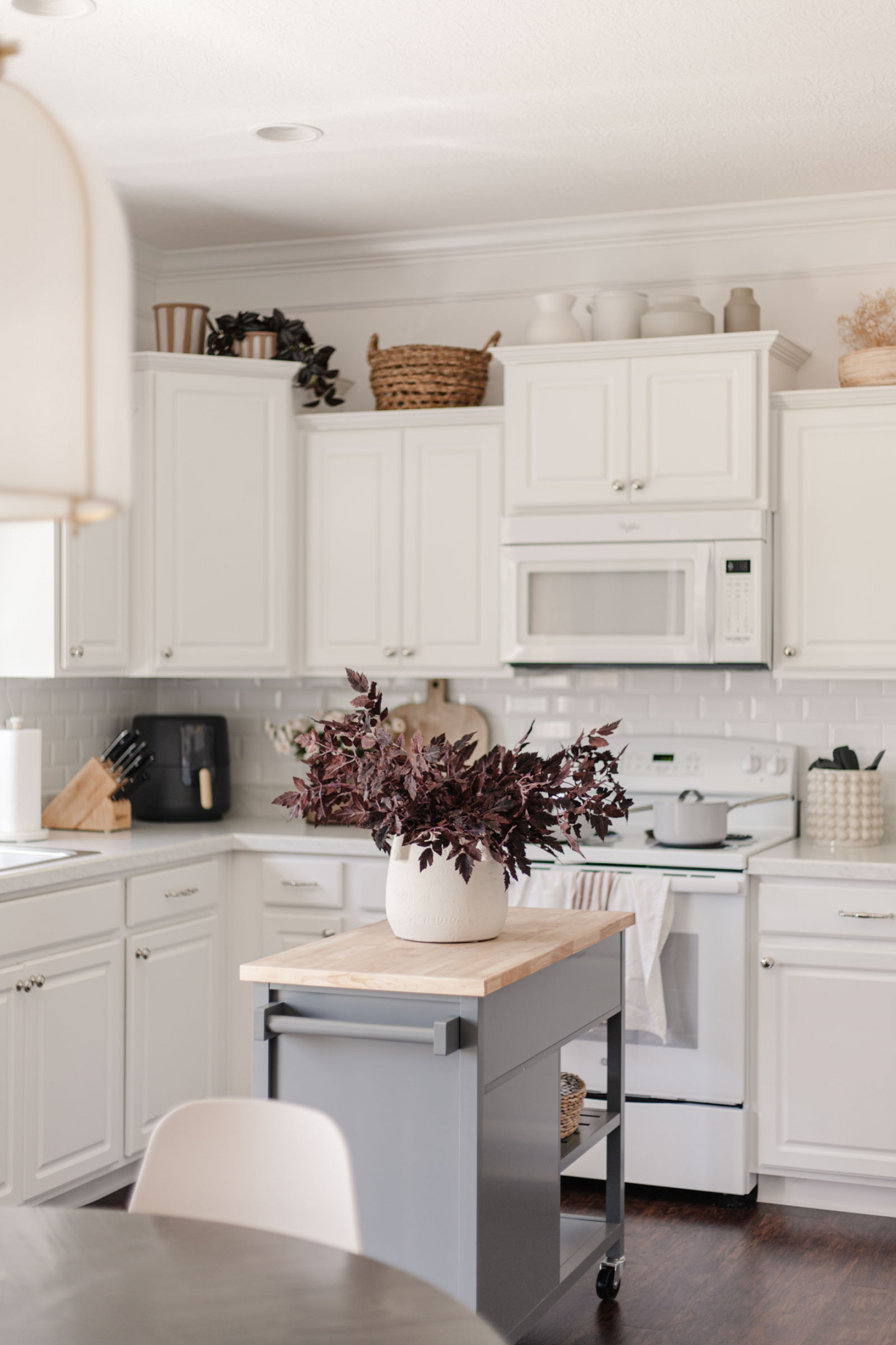 How to Decorate Above Kitchen Cabinets in  - Caitlin Marie Design