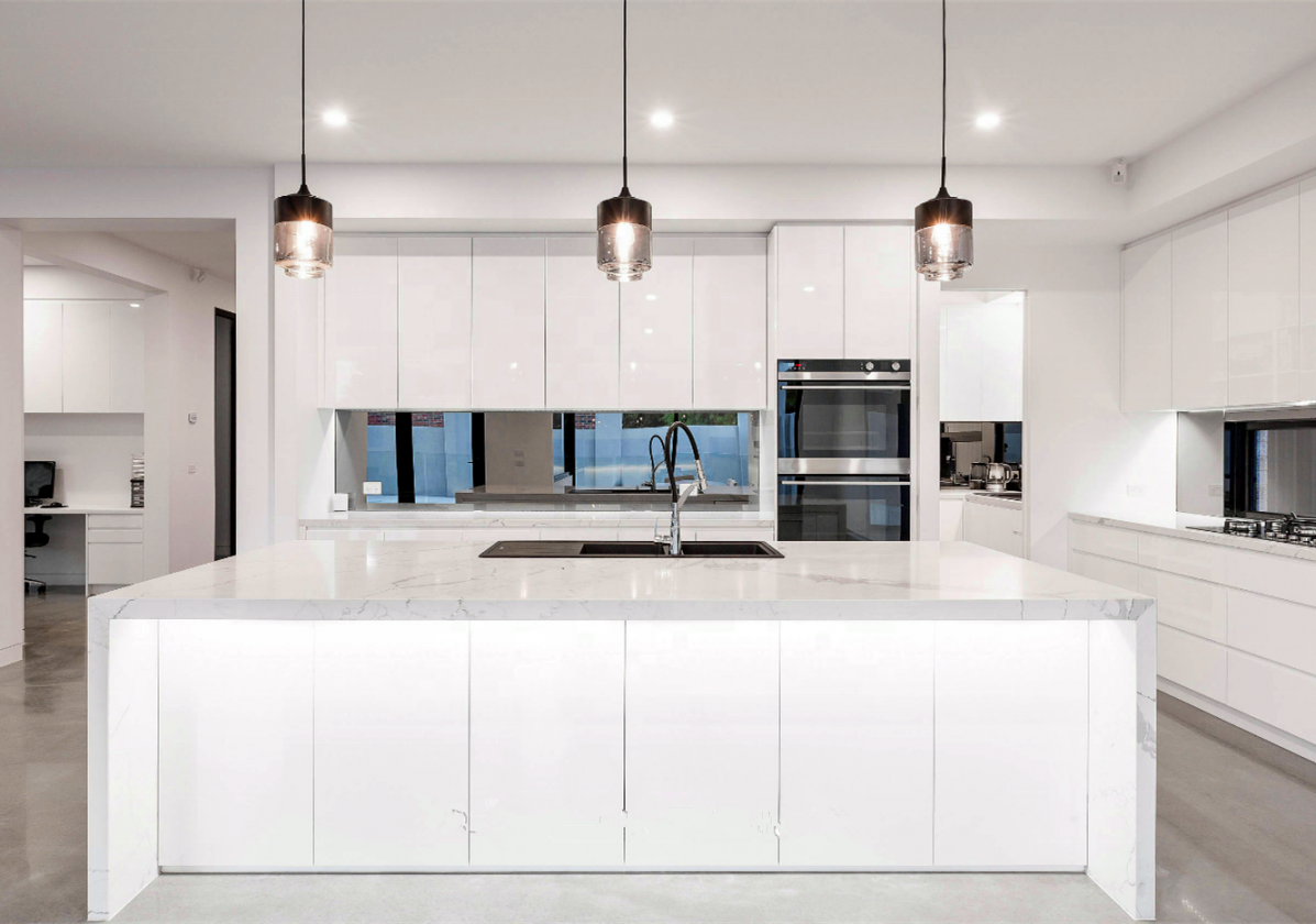 Modern White Kitchen With Waterfall Island  White modern kitchen