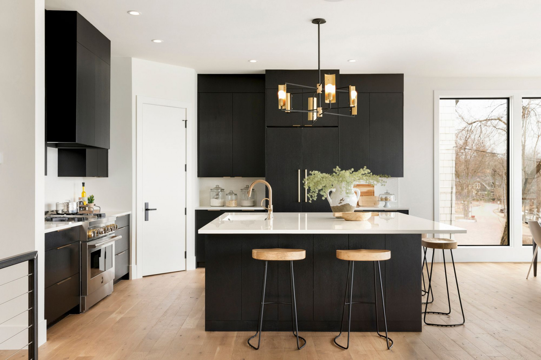 Sleek, Modern Black & White Kitchen with White Oak Floors