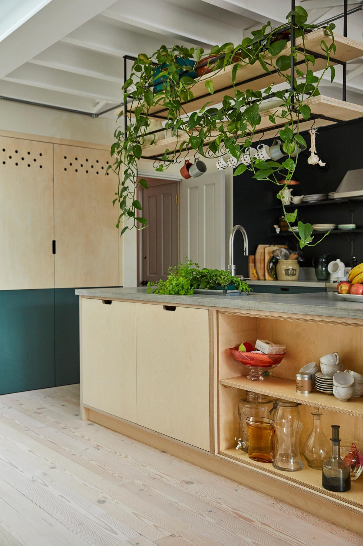 Open Shelves Hang Over Kitchen Island  Kitchen projects, Quirky