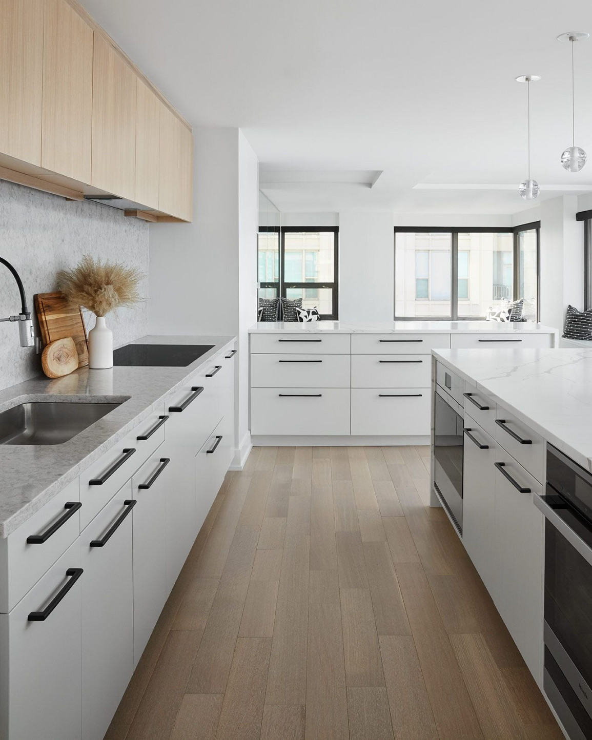 We kept the lower cabinets a soft gray with contrasting black