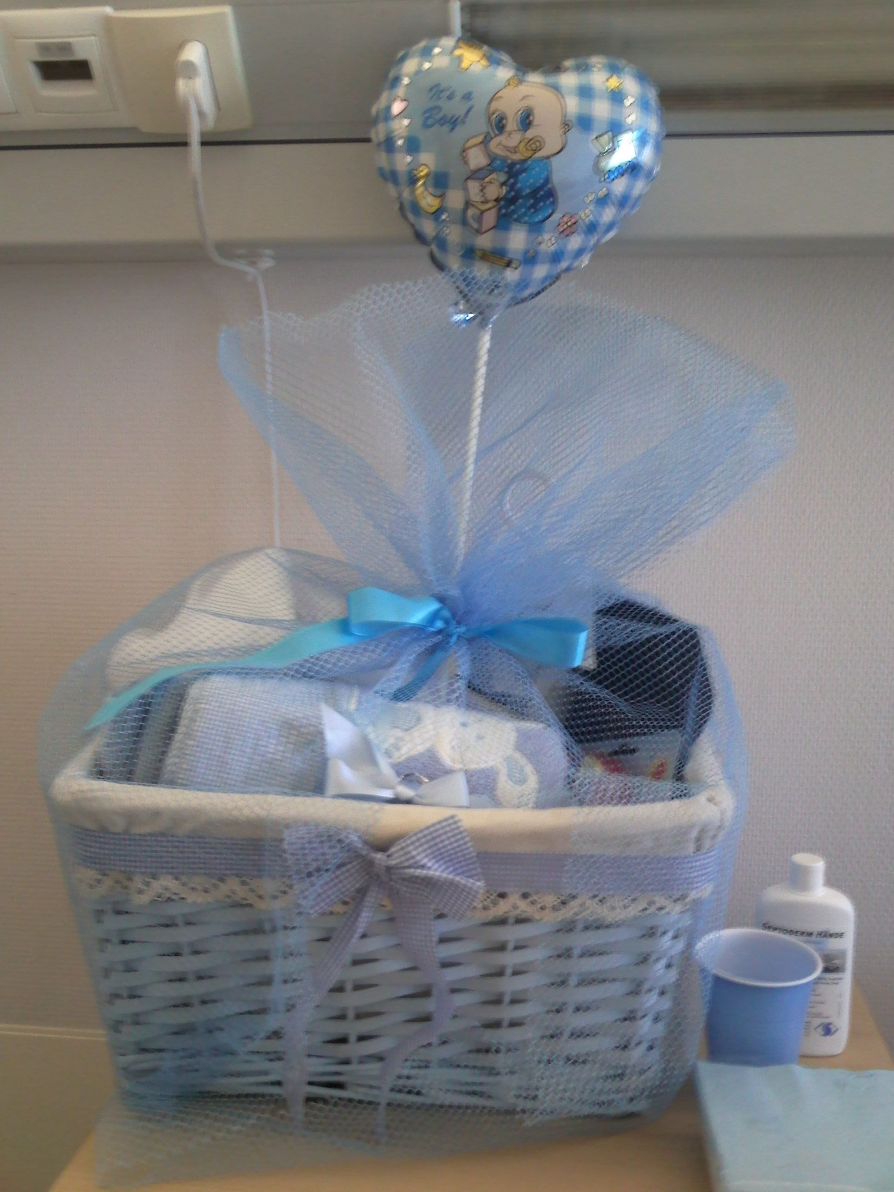 Baby gift and wrap idea! A nice basket with various presents