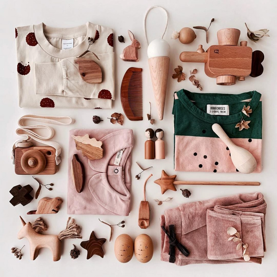 flat lay, pink, baby clothes, wood toys, play, kids clothes